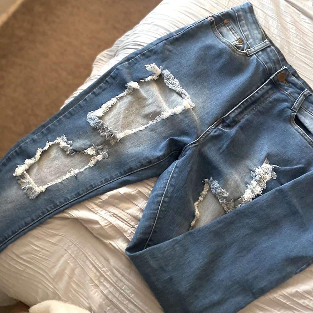 Blue distressed jeans